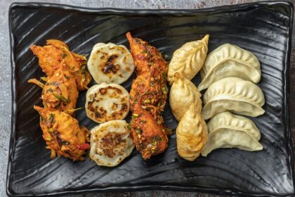 An image of dumplings which is one of the famous dishes to try in Himachal Pradesh.