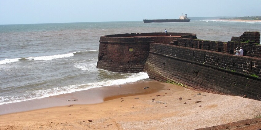 Fort Aguada is a historical landmark, offering stunning views of the ocean waves in front.