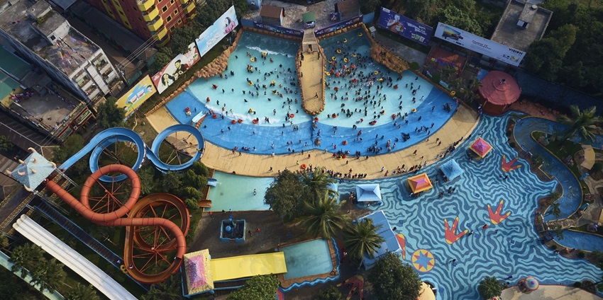 Panoramic aerial view of the water theme park in Goa, amidst the bustling city