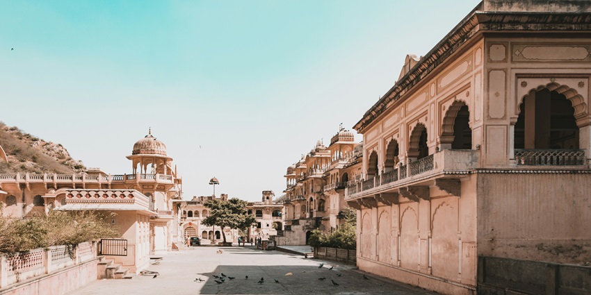The serene water spring at Galtaji Temple, reflects the temple's timeless beauty.