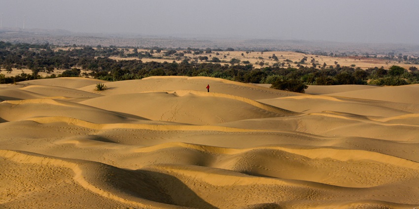 Image of san dunes near a village in Rajasthan - places to visit near ajmer within 100 kms