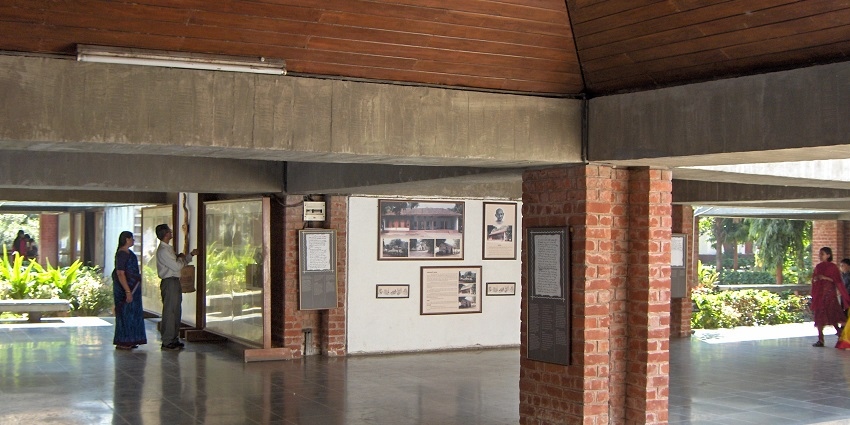 Visitors exploring various exhibitions inside the famous Gandhi Ashram in Gujarat