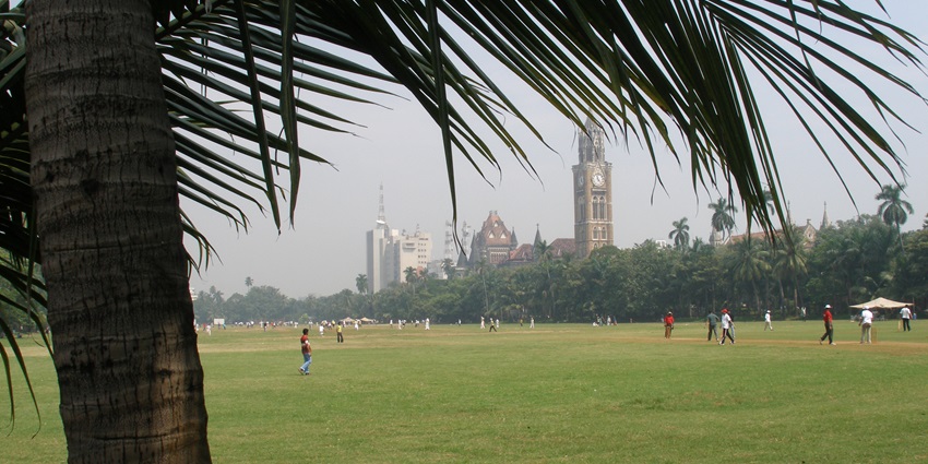 An image of a park with kids playing resembling the vibes of Gandhi Park in Ongole, Andhra Pradesh