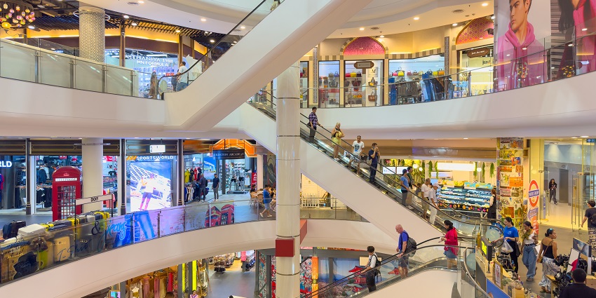 Vibrant floors inside the mall, with visitors wandering through different shops