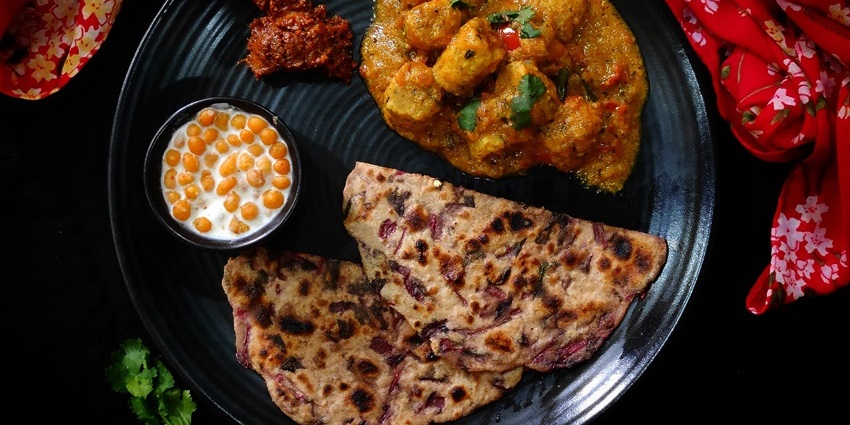 A plate of Gatte Ki Sabzi, the best food in Kota to try for a Rajasthani experience