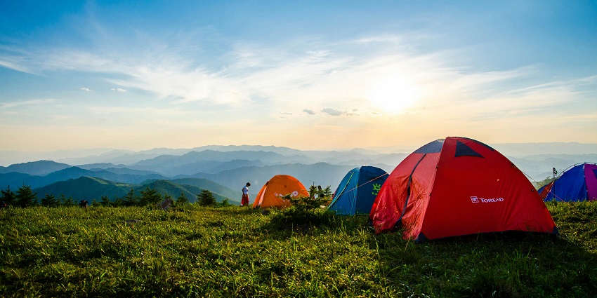 With grassy field, picnic setup, and tent, this place is great for camping in Nepal.