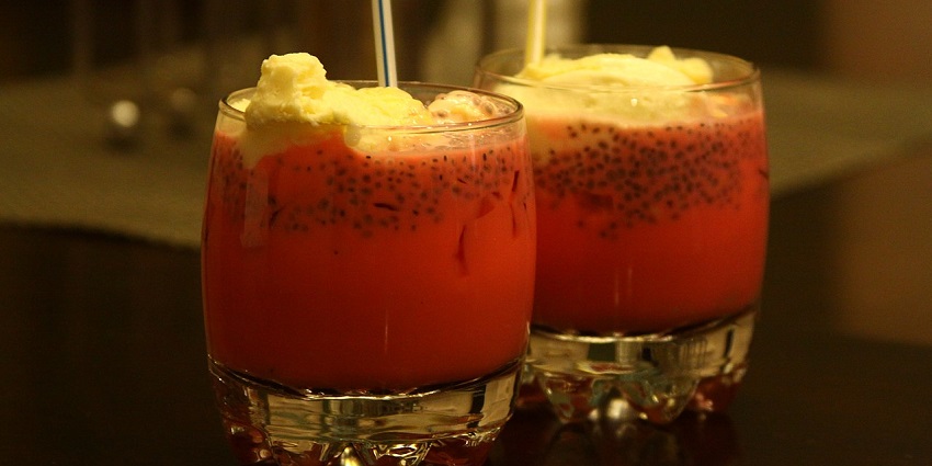 Rose faluda served in an eye pleasing way, showcasing all its vibrant shades