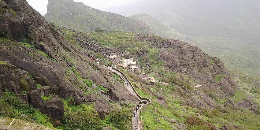 A bird’s eye view of the towering peaks and lush green vegetation of Girnar Hills.