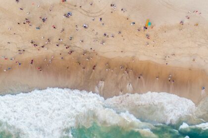 An image of Calangute Beach and people having a great time with their families.