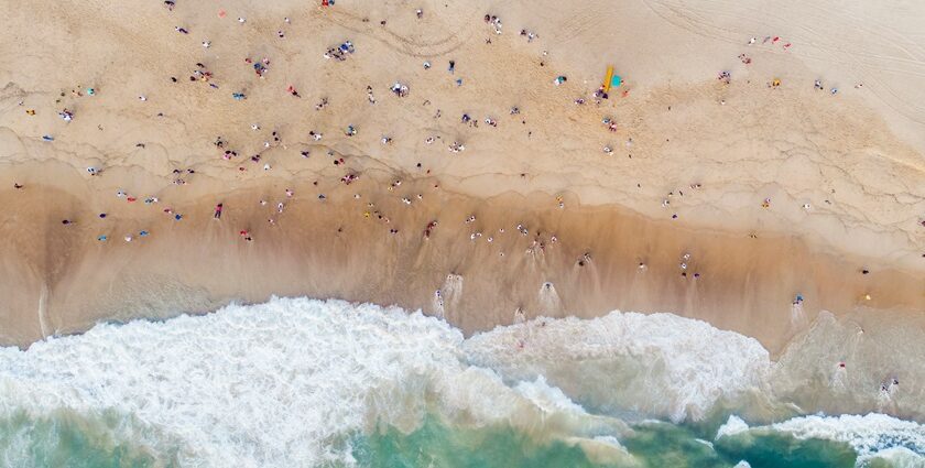 An image of Calangute Beach and people having a great time with their families.