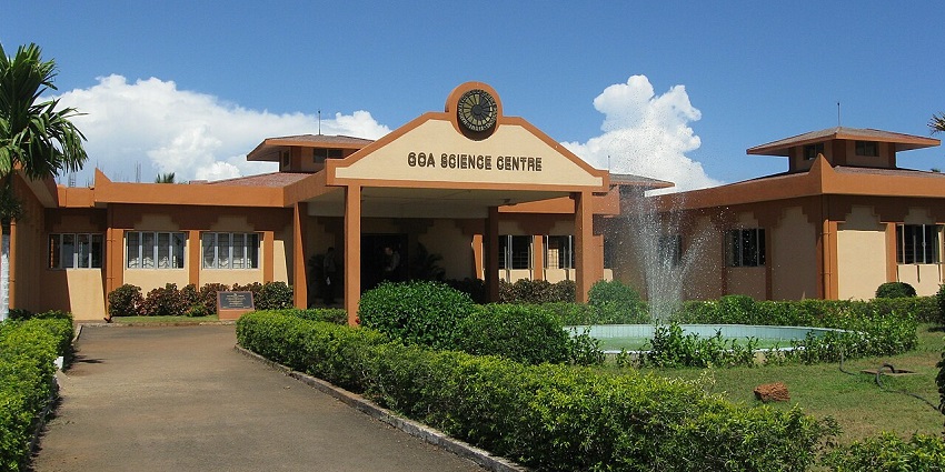A mesmerising frontal view of the Goa Science Centre surrounded by lush greenery.