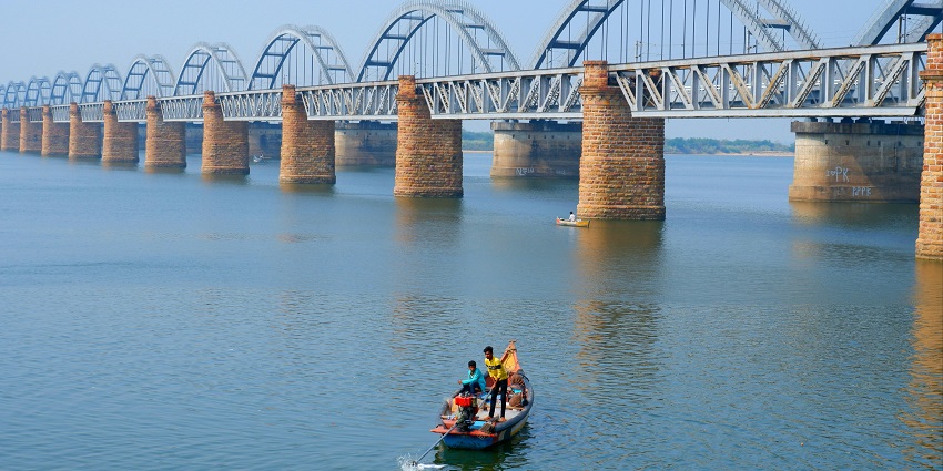 Godavari River flowing through lush green banks with a serene and expansive view