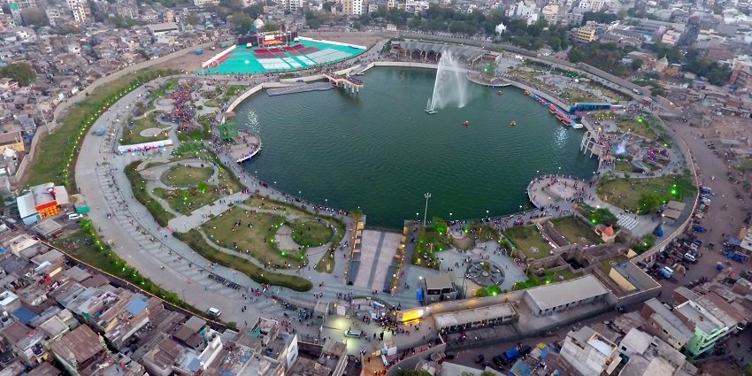 Aerial view of Gopi Talav, taken by drone, surrounded by city buildings