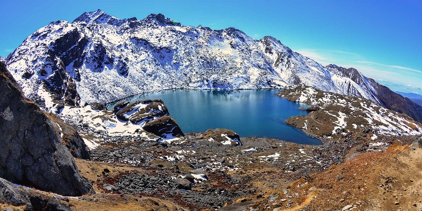 Gosaikunda Lake, a famous place for trekking in Nepal surrounded by snow-capped mountains