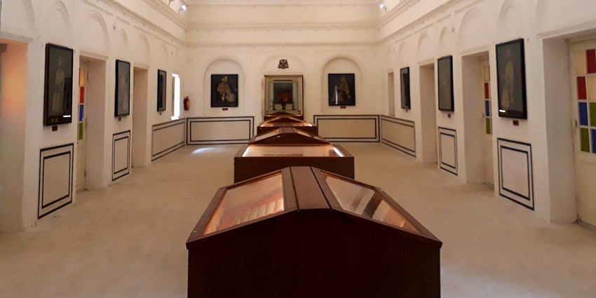 A view of an art gallery in Jhalawar Museum, showcasing various exhibits and artifacts.