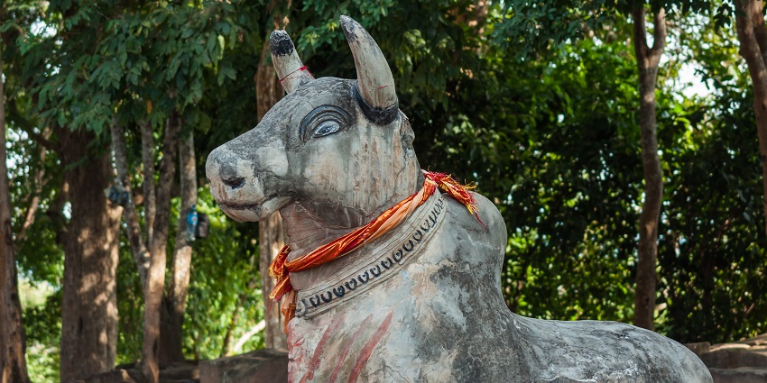 Gowmukh Teerth's cow-shaped structure attracts pilgrims for meditation and reflection.