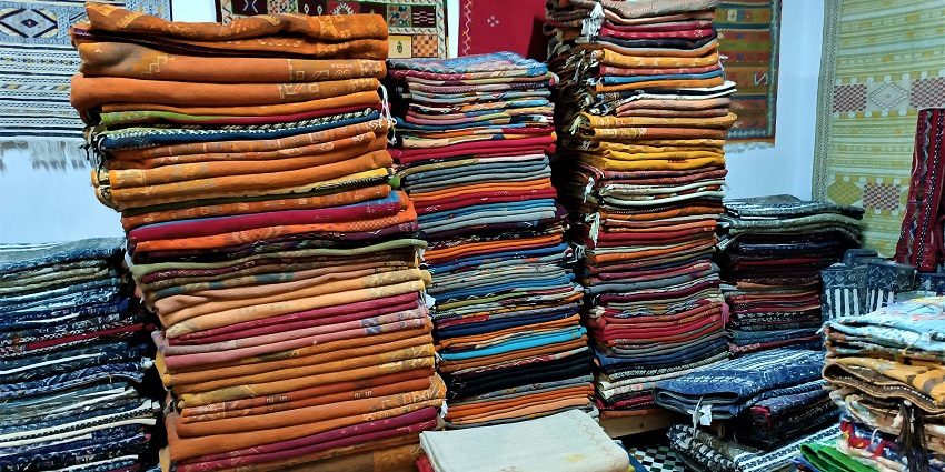 A glimpse of sarees systematically piled up and kept on a table in Greater Kailash.