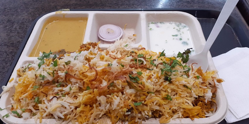 Plate of vegetable biryani, a flavorful rice dish with vegetables, showcasing vibrant colours and rich spices.