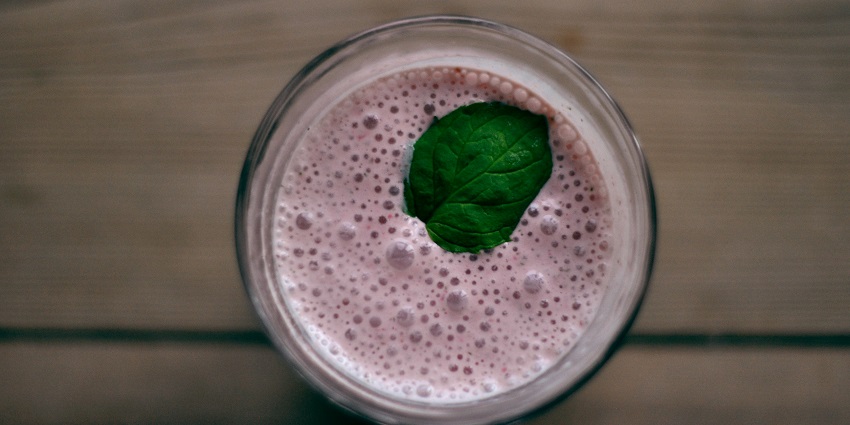 Gulkand Lassi is a creamy yoghourt drink with rose jam, nuts, and saffron.