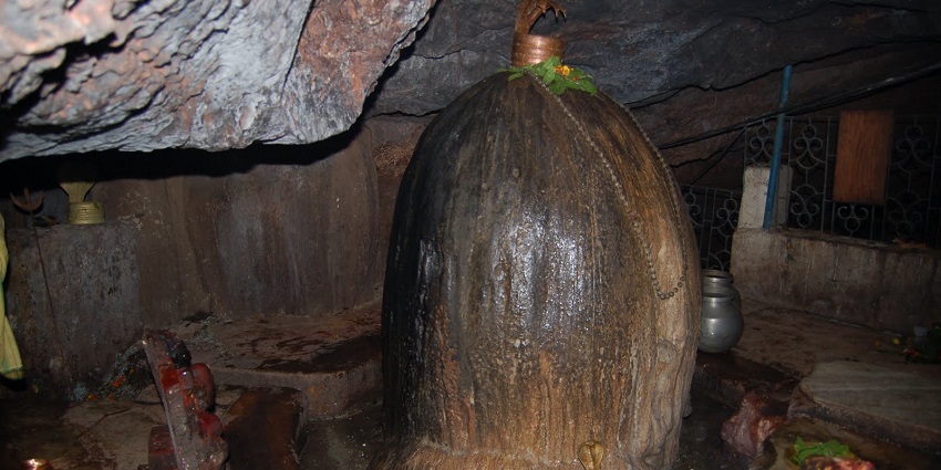 Gupteshwara Shiva Lingam, a sacred representation of Lord Shiva surrounded by cave rocks