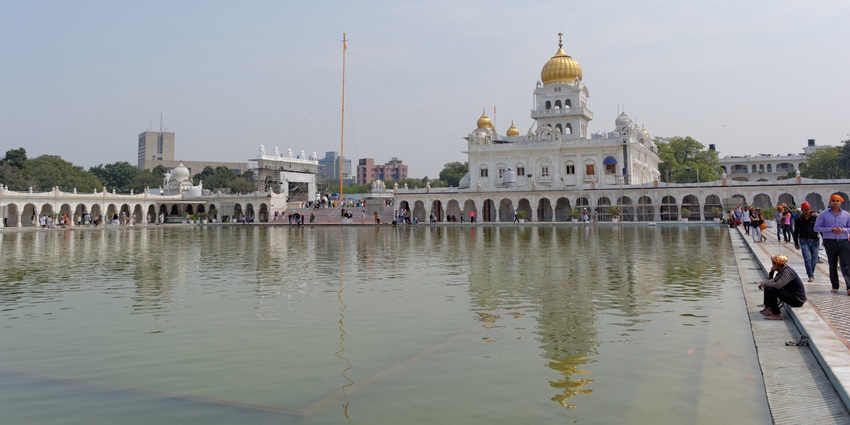 A picture of the spiritual Gurudwara Bangla Sahib taken from the edge of its holy pond