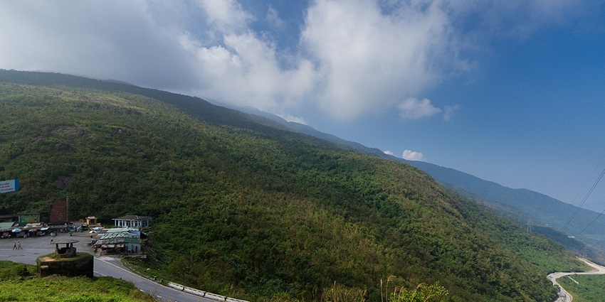 Scenic mountain road with panoramic views, winding through Hai Van Pass in central Vietnam.