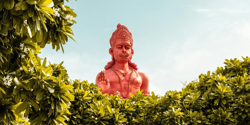 Bustling street in Delhi, showcasing vibrant shops - Hanuman Temples in Delhi.