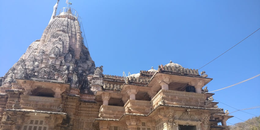 Wide angle shot of the temple roof with the blue sky on the backdrop