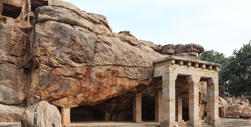 Man-made entrance pillars and steps leading to the rocky Hathigumpha caves, Odisha.