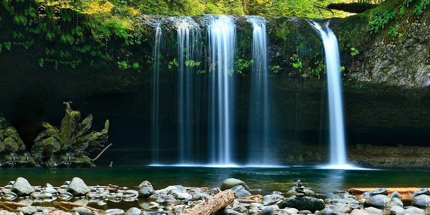 Image of scenic Hathni Mata Waterfall in the lush Pavagadh Hills