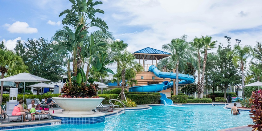 A vibrant water park with thrilling slides, a rain dance area, and lush greenery, one of the best things to do in Ajmer.