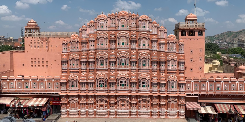 Image of Hawa Mahal is a five-story pink sandstone palace with 953 windows