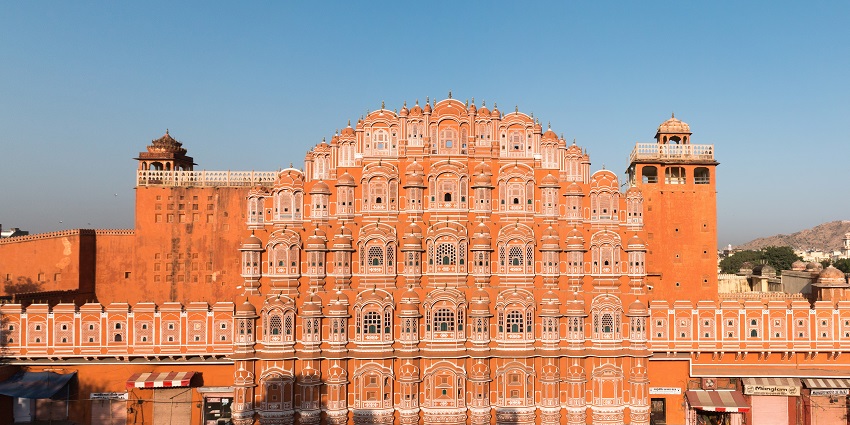 Panoramic view of the Hawa Mahal, a famous place near Jaipur Zoo, featuring red facade.