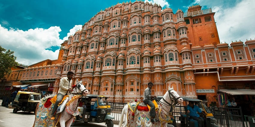 Hawa Mahal, a stunning pink sandstone palace in Jaipur, features intricate lattice work.
