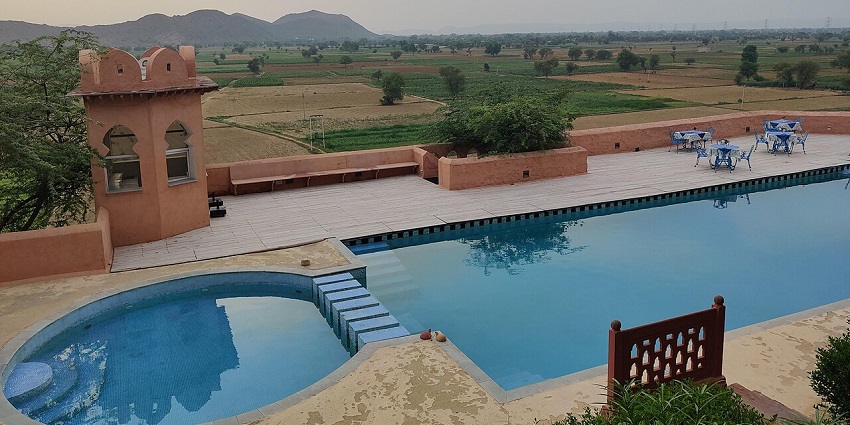 View of the beautiful sunset from hill fort Kesroli along its terrace pool