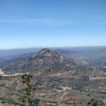 Panoramic view of verdant hill stations near Bangalore, with thick forests, and a serenity.