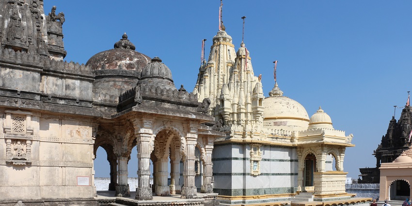 Beautiful architecture of the temples visible from a balcony and clear blue sky in the backdrop