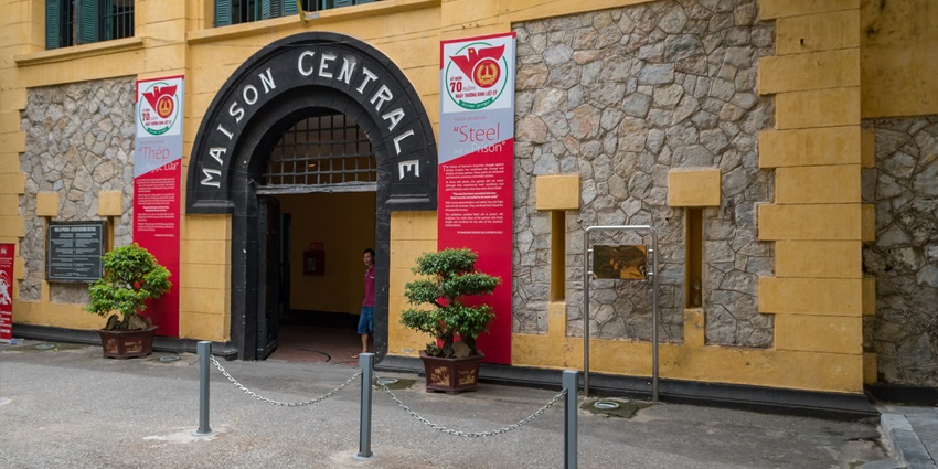 Historical Hoa Lo Prison Museum in Hanoi showcasing prison architecture and exhibits.
