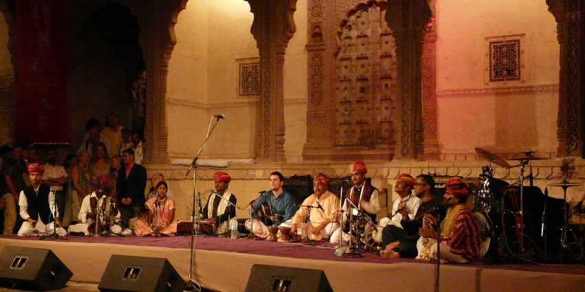 Pushkar music festival celebrates Sufi music, fostering harmony near temples.