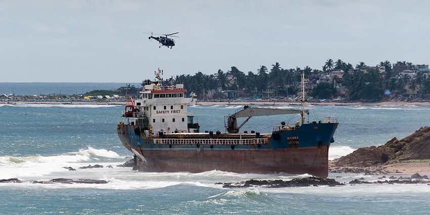 A helicopter hovers above the beached ship at Tenneti park, near Submarine museum vizag