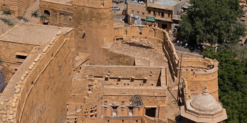 Ancient stone ammunition atop Suraj Prol at Jaisalmer Fort, echoing its rich historical past.