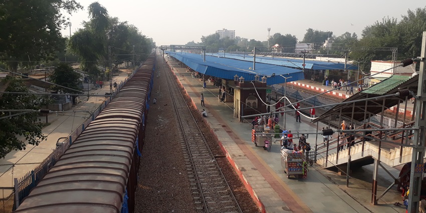 Exterior view of Alwar railway station, showing the building's architecture and surrounding area