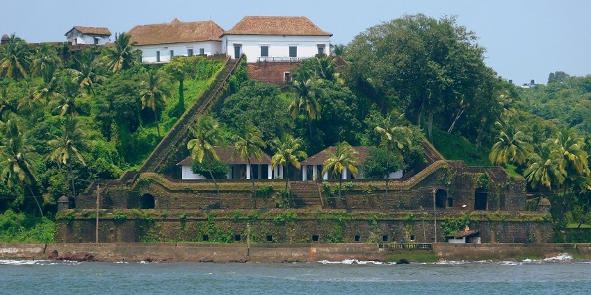 View of the roof of the Betul fort surrounded by lush trees on all sides