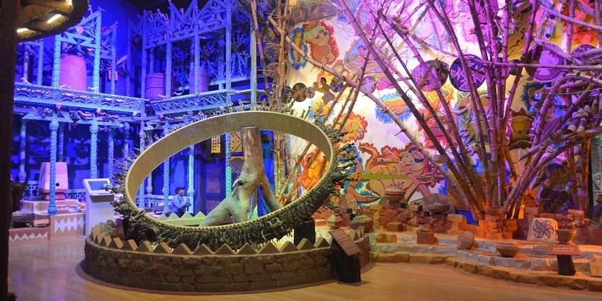 Vibrant art displays and interior decor of the Tribal Museum showcasing rich tribal culture and art.