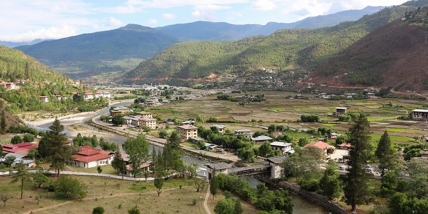A scenic view of Paro town, showcasing Bhutan's natural beauty near Sakteng Sanctuary.