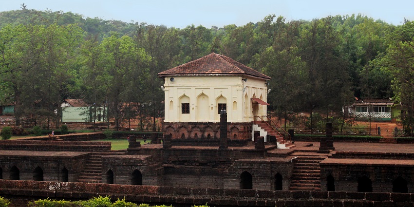 Small building of the Surla mosque standing amidst beautiful gardens