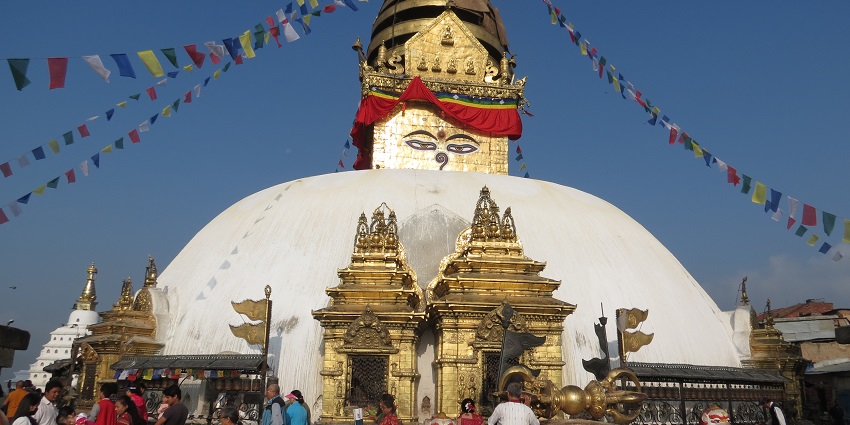 View of Swayambhunath Temple, also known as Monkey Temple, with surrounding prayer flags.