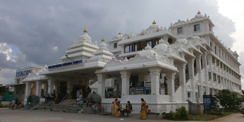 Distant view of the ISKON temple, offering a spiritual retreat for all devotees