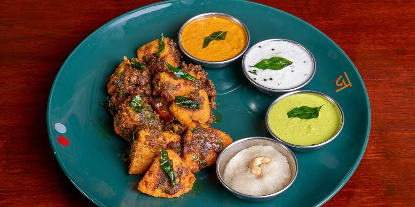 A beautifully arranged plate of colourful food, showcasing fresh ingredients and vibrant flavours.