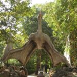 The entrance of Saranthana Nature Park, large gates leading into lush landscapes